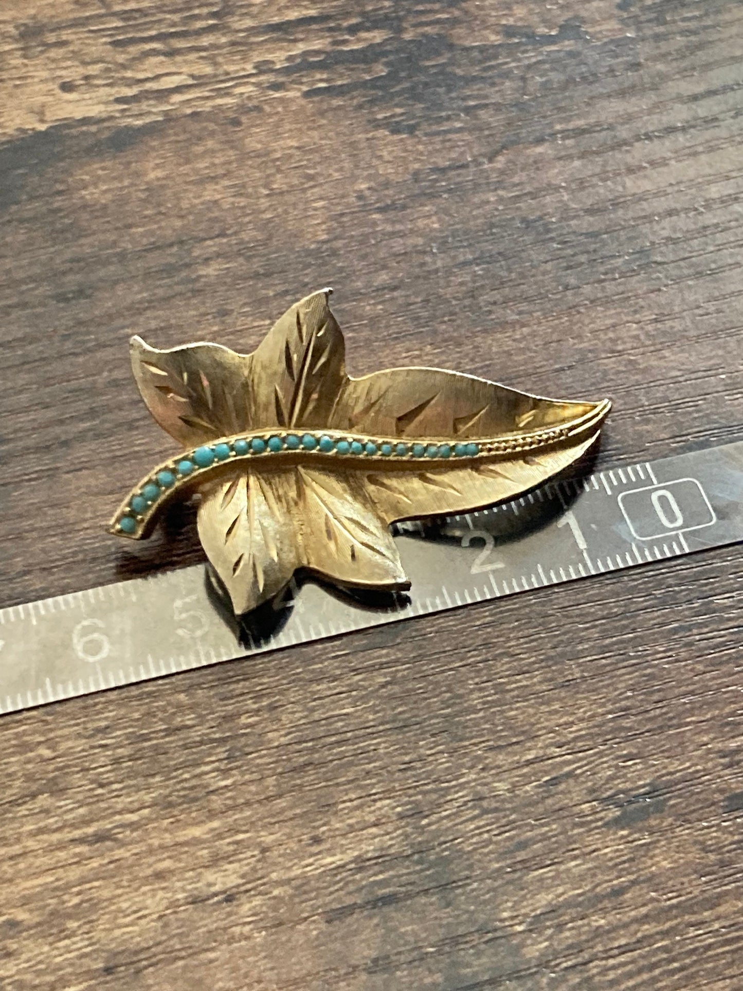 Signed Sphinx vintage gold tone leaf brooch with blue turquoise paste