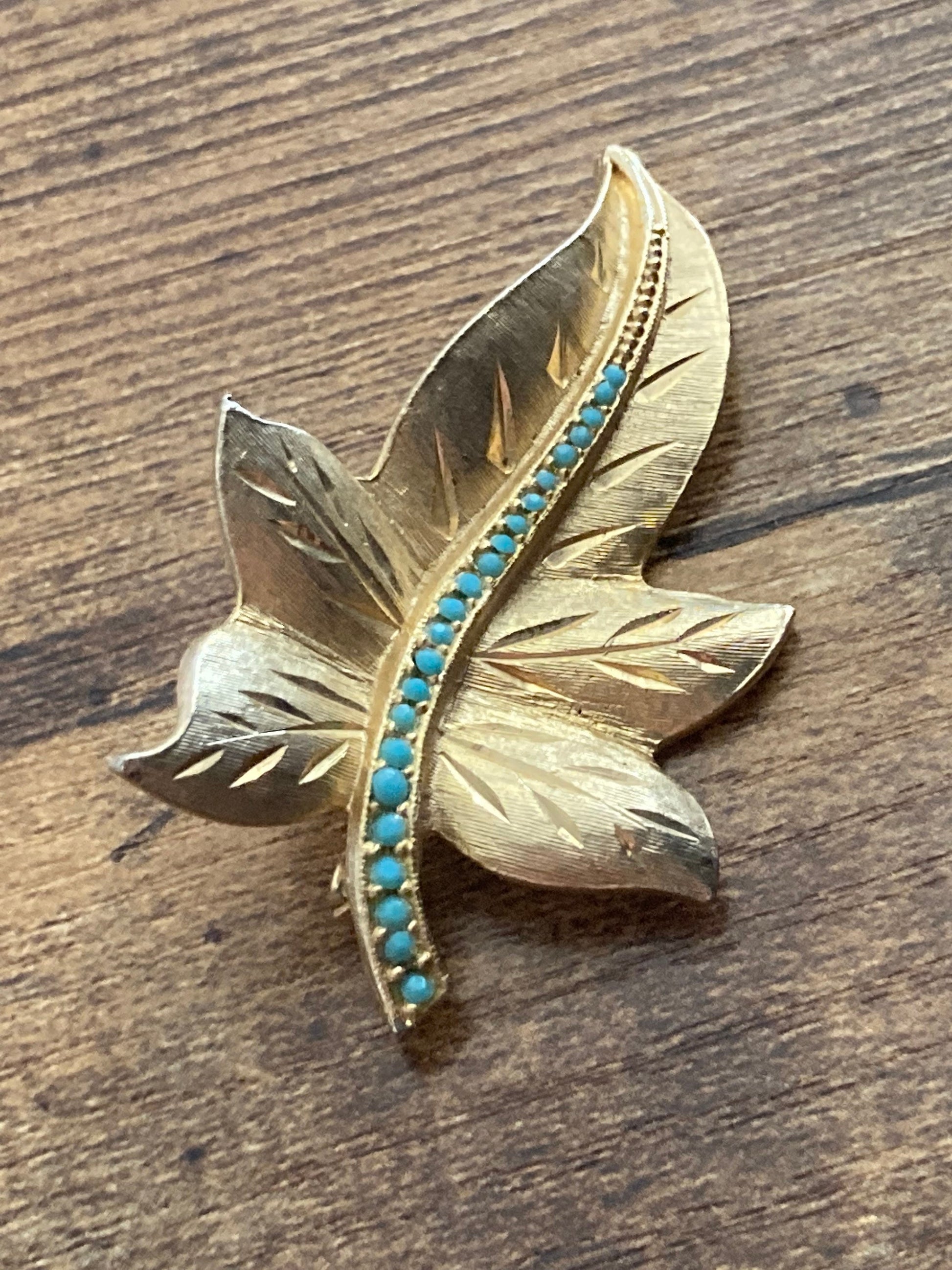Signed Sphinx vintage gold tone leaf brooch with blue turquoise paste