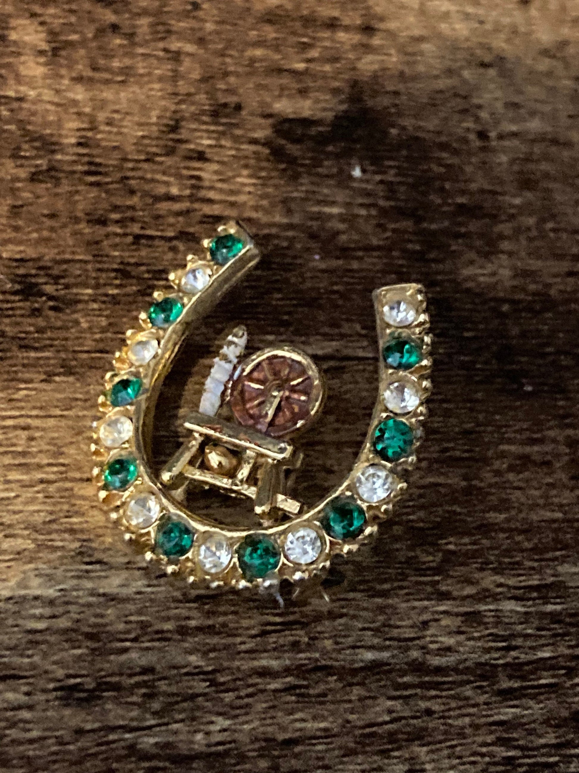 Spinning wheel Vintage lucky horseshoe clear green diamanté gold brooch