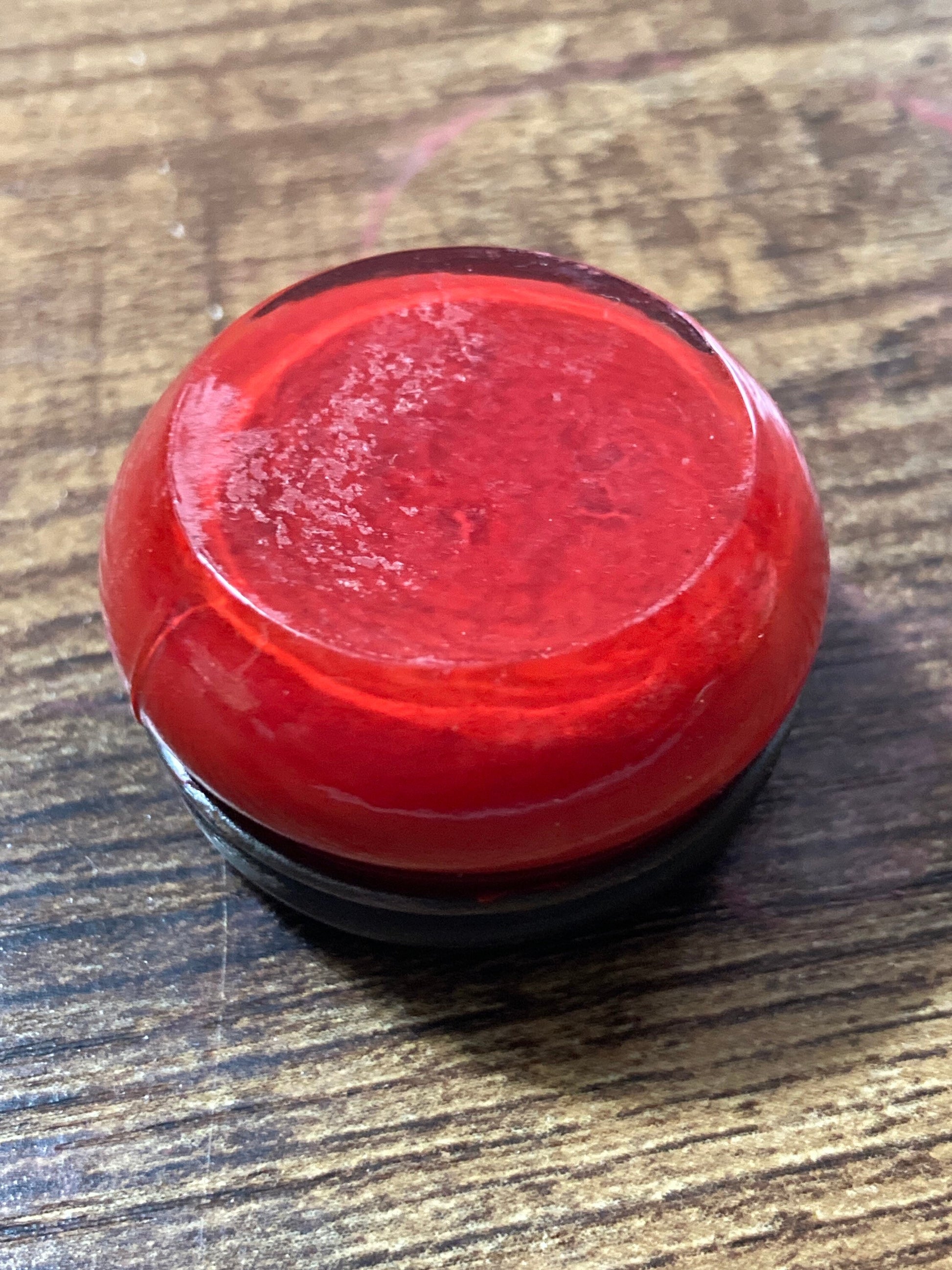 Vintage cosmetics sealed bright red lip tint or cheek stain glass jar black metal screw lid unused antique cosmetics art deco mid century