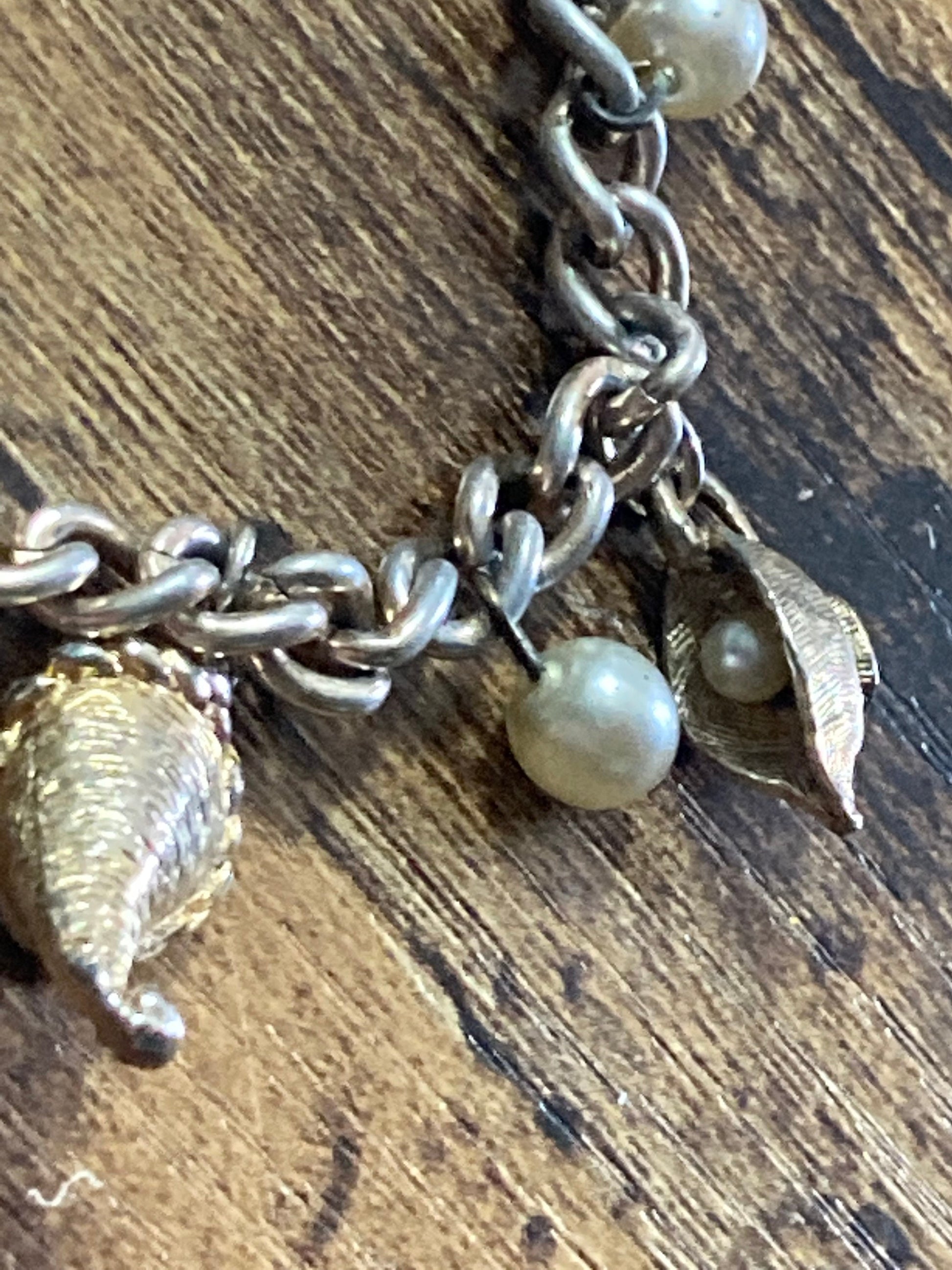 vintage 1970s Gold tone chain link charm bracelet faux Pearl charms eggs in basket hat jug