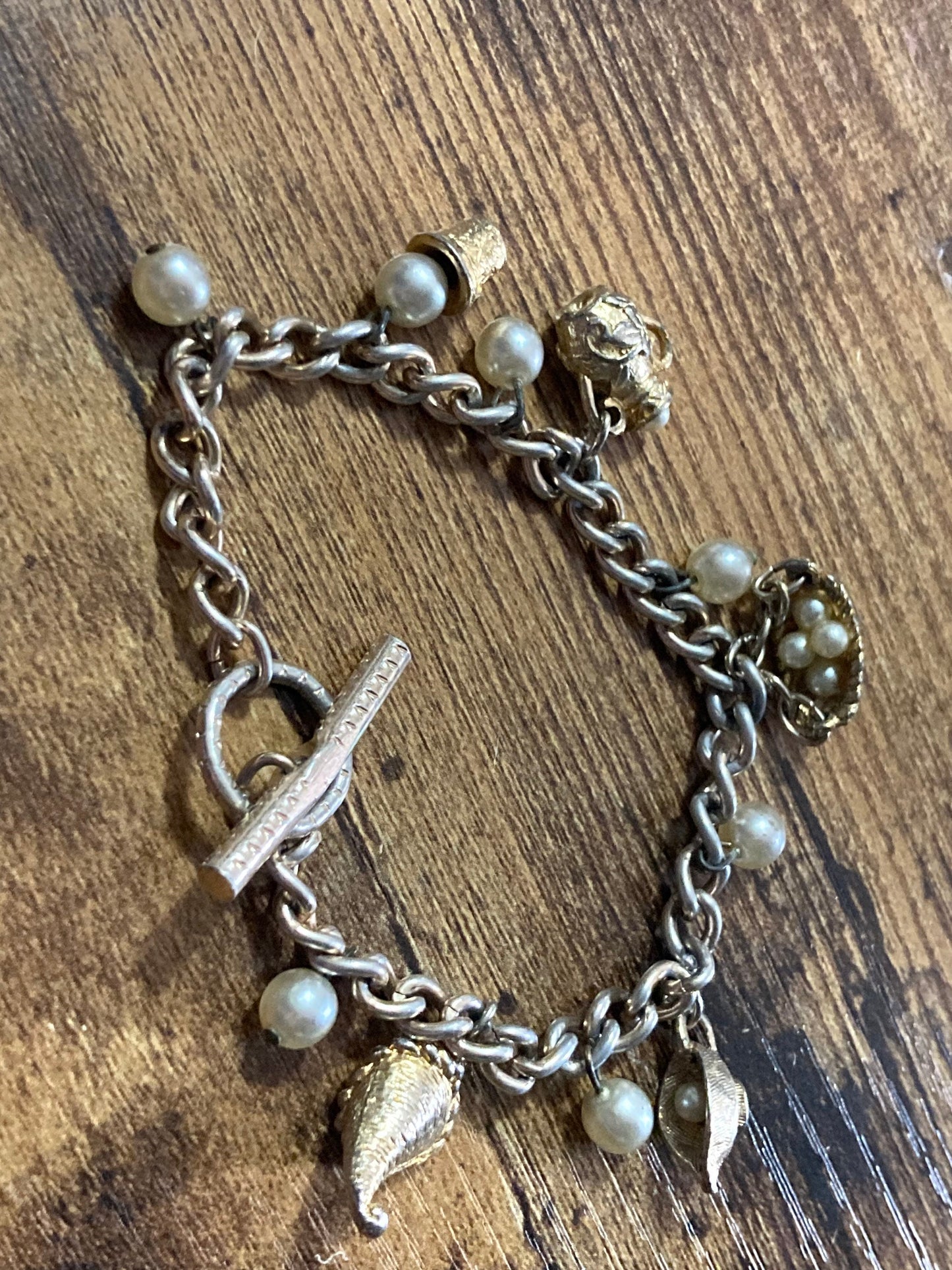vintage 1970s Gold tone chain link charm bracelet faux Pearl charms eggs in basket hat jug
