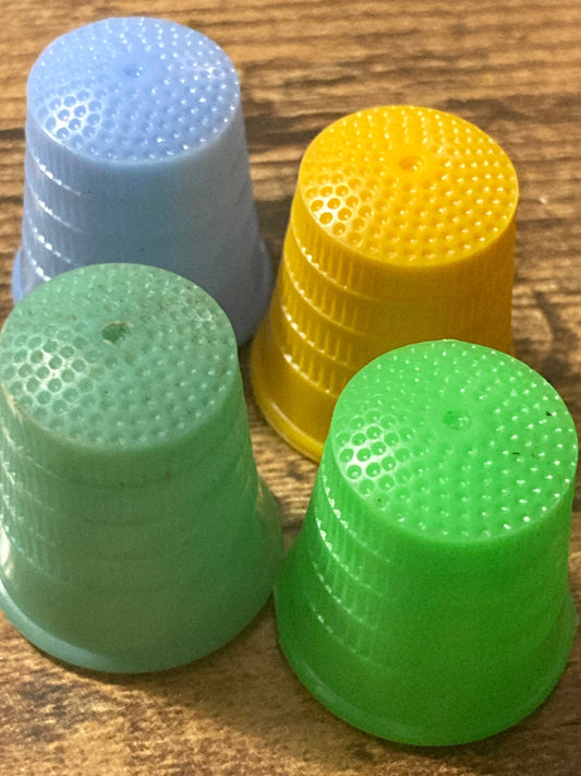 Size L Large set of 4 Art Deco galalith early plastic coloured sewing thimbles