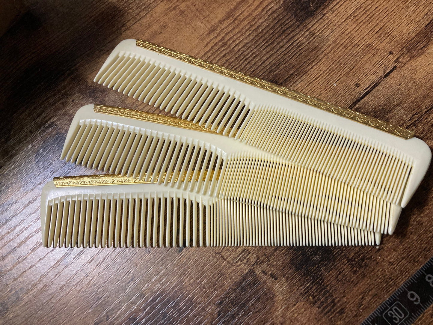 New old True vintage 1960s cream hair comb gold detail