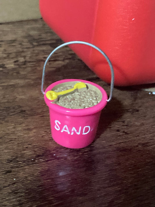 Doll’s house or cake topper miniature sand bucket and spade decoration seaside nautical scenery