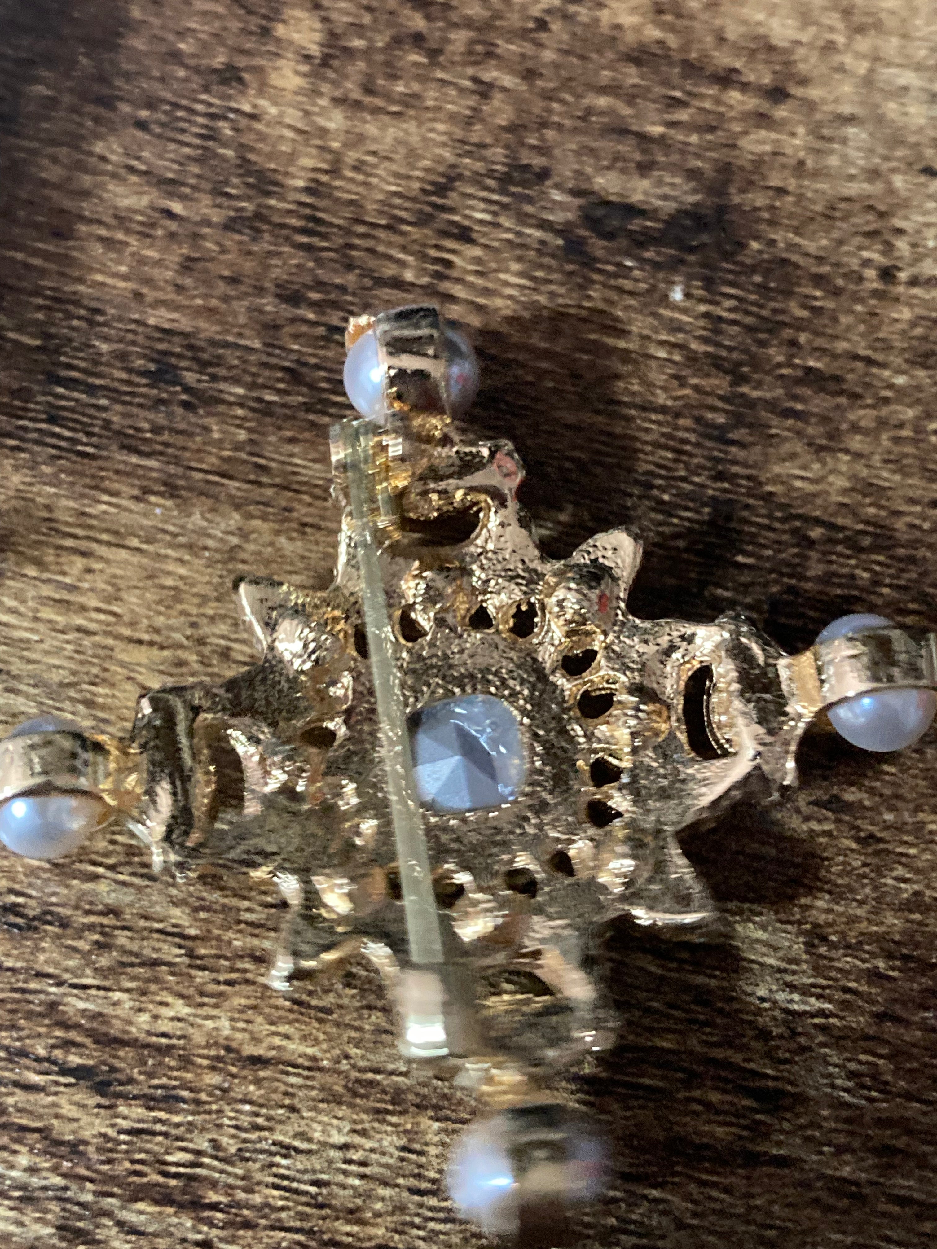 Pearl and Diamanté cross brooch with pink and emerald green stones