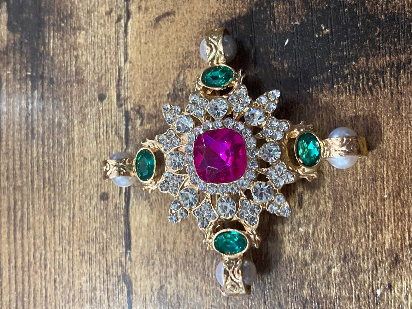 Pearl and Diamanté cross brooch with pink and emerald green stones