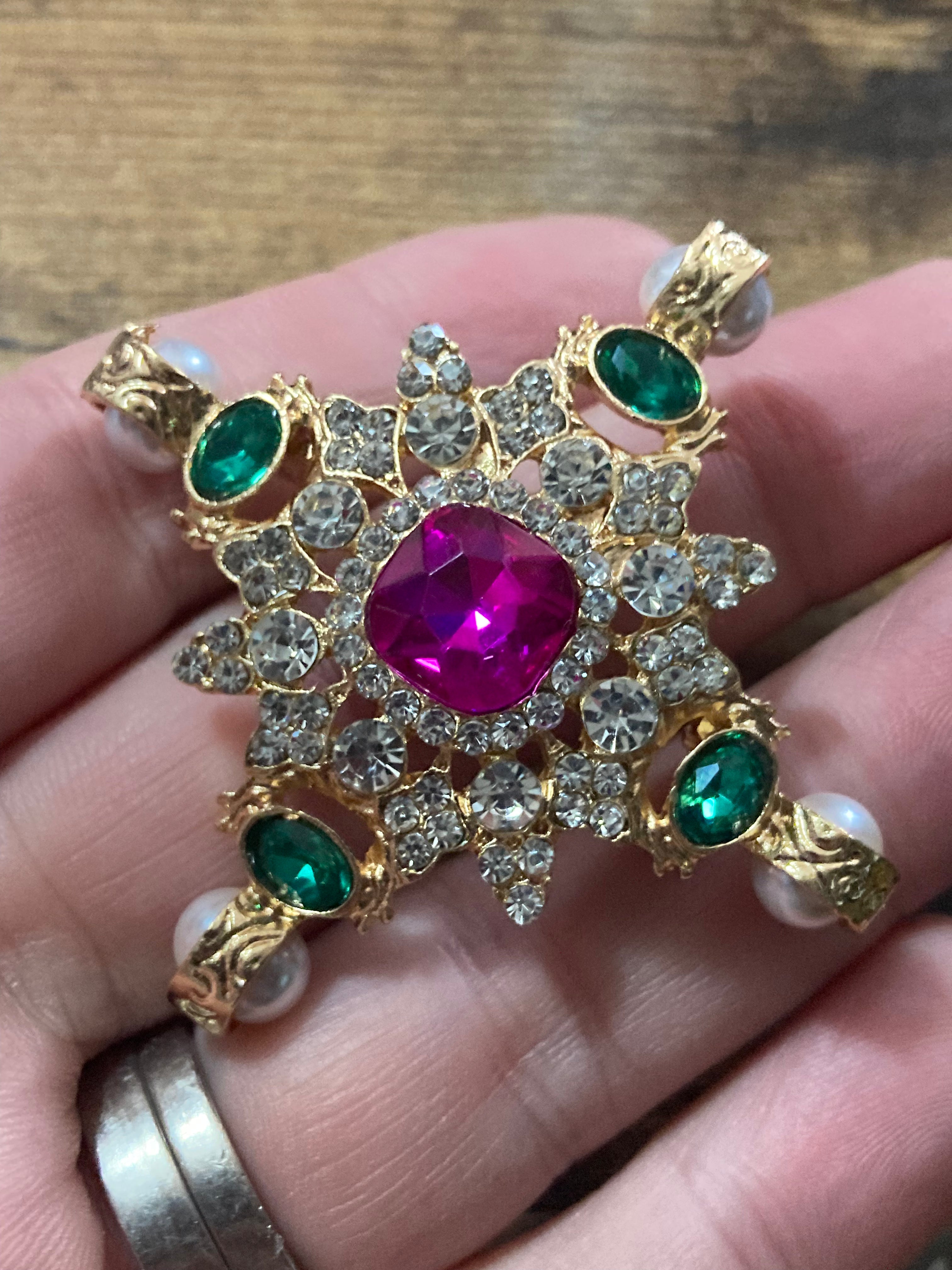 Pearl and Diamanté cross brooch with pink and emerald green stones