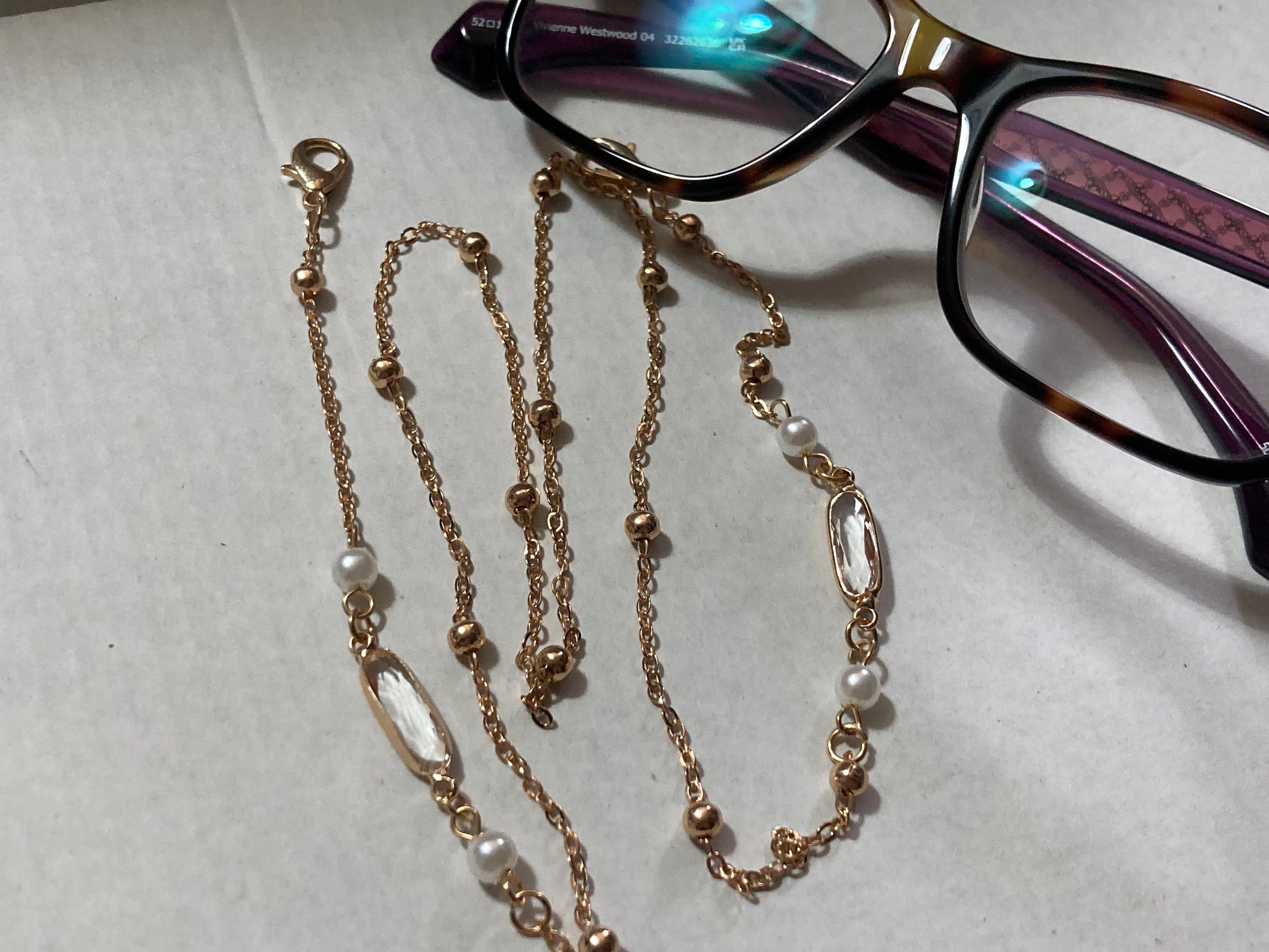 Never lose your glasses sunglasses chain gold tone rivi re bezel