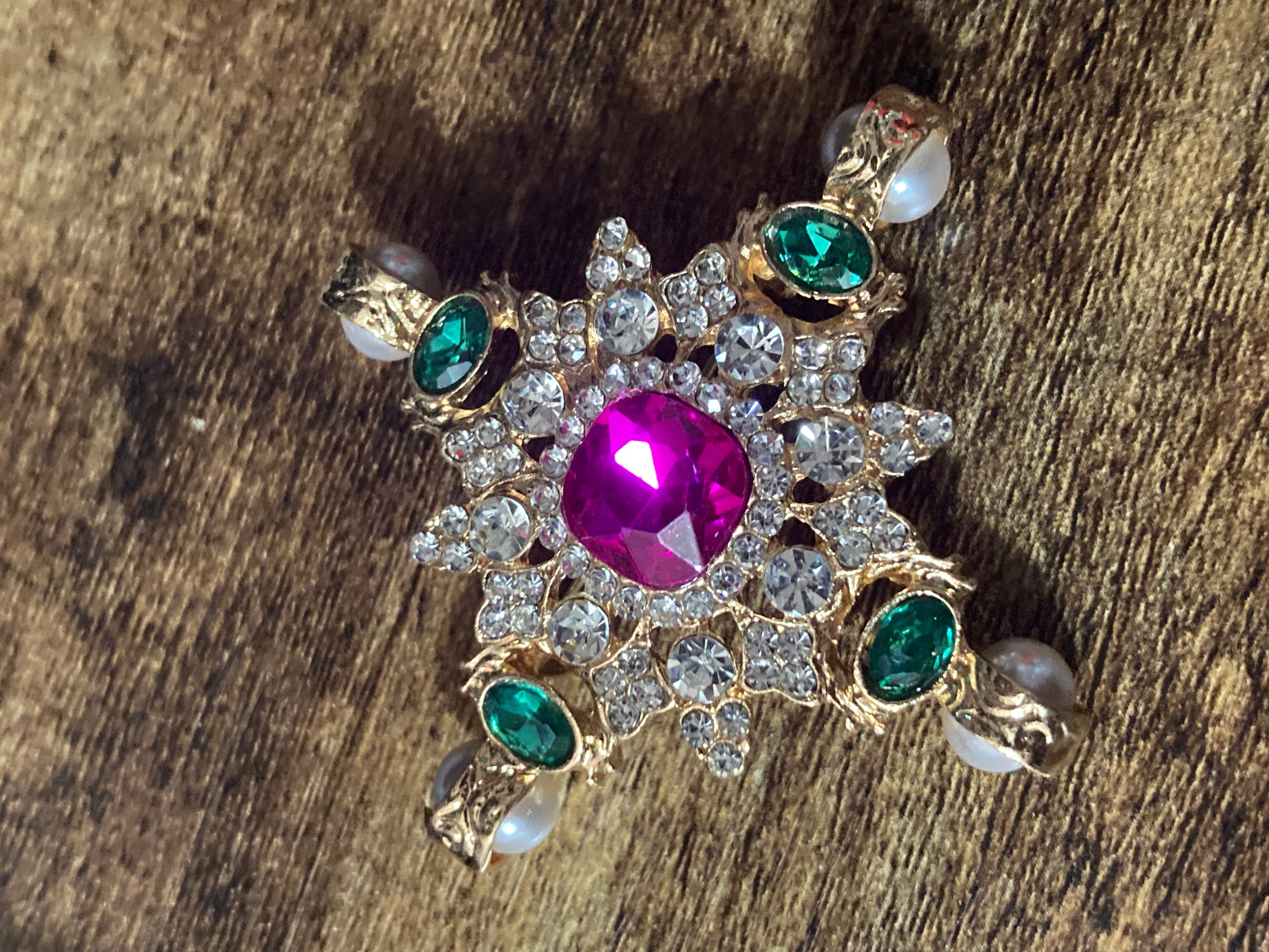 Pearl and Diamanté cross brooch with pink and emerald green stones